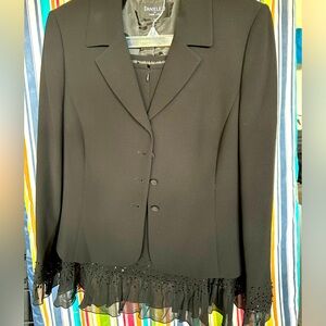 Black skirt suit with beaded and ruffled detail